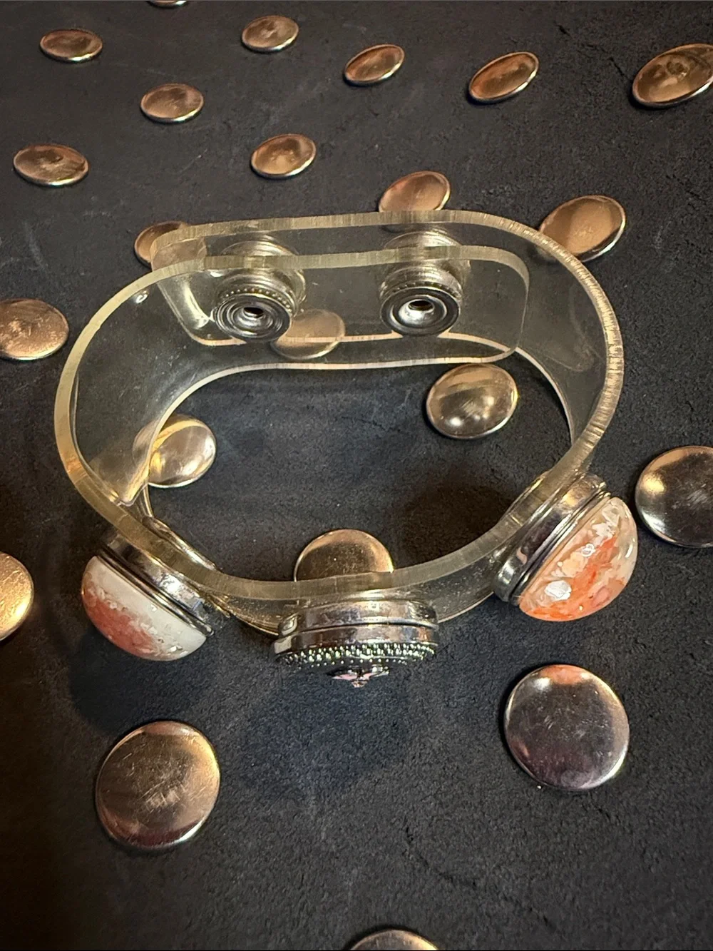Clear plastic 3 snap bracelet with snaps